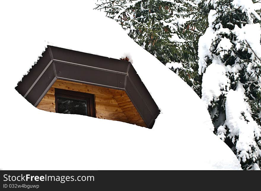 Roof and window covered with snow. Roof and window covered with snow