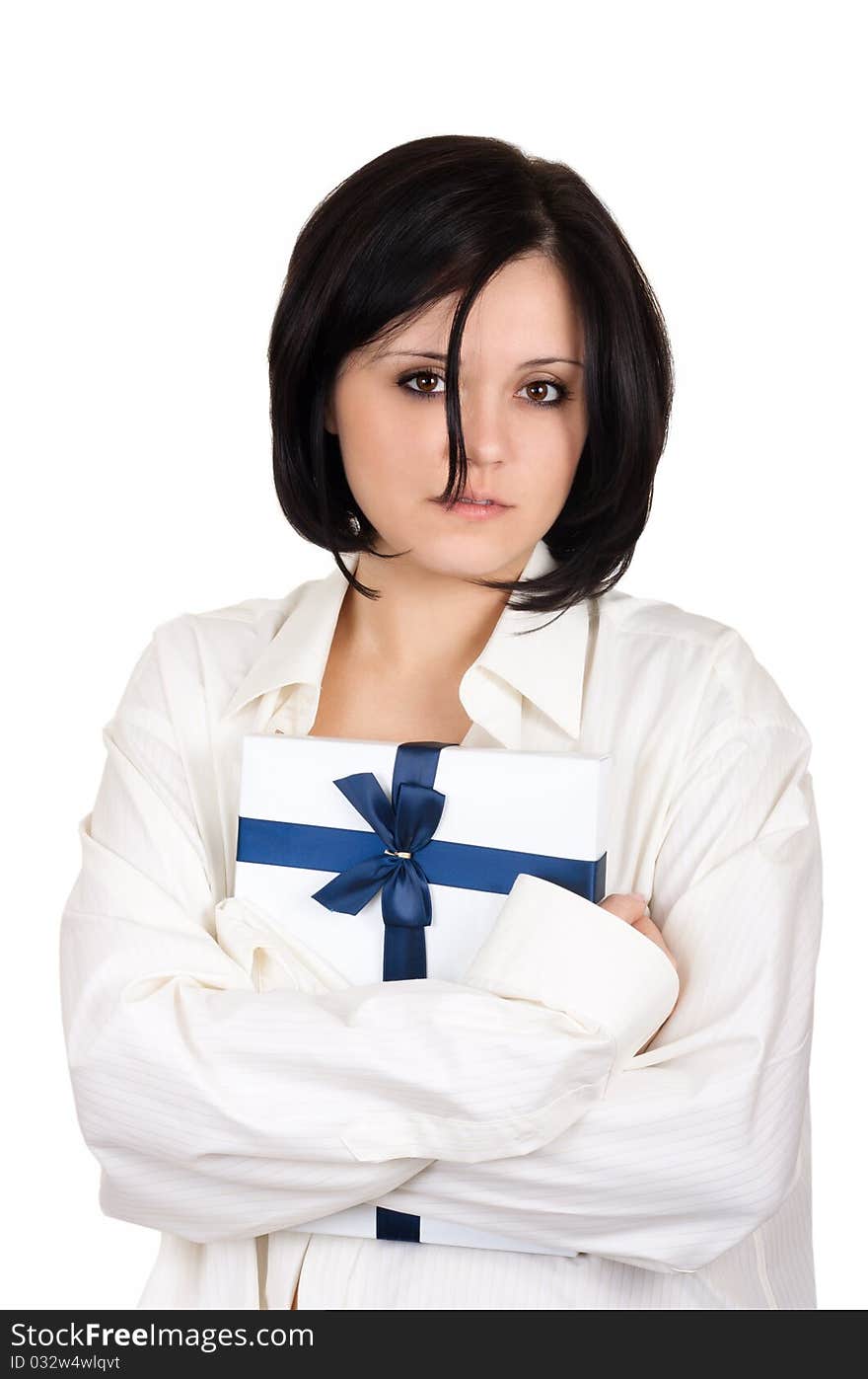 Young sexy woman in a white mans shirt holding a gift. Young sexy woman in a white mans shirt holding a gift