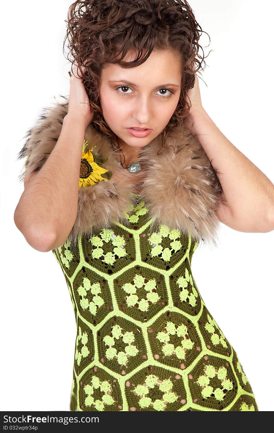 Face of a beautiful young woman with brown long ringlets hairs. Face of a beautiful young woman with brown long ringlets hairs