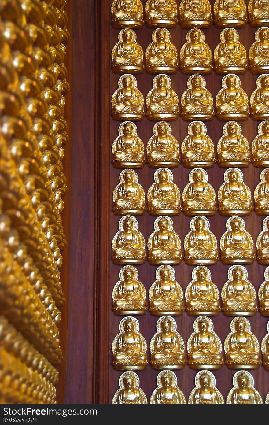 Small buddha in row perspective tiles in temple