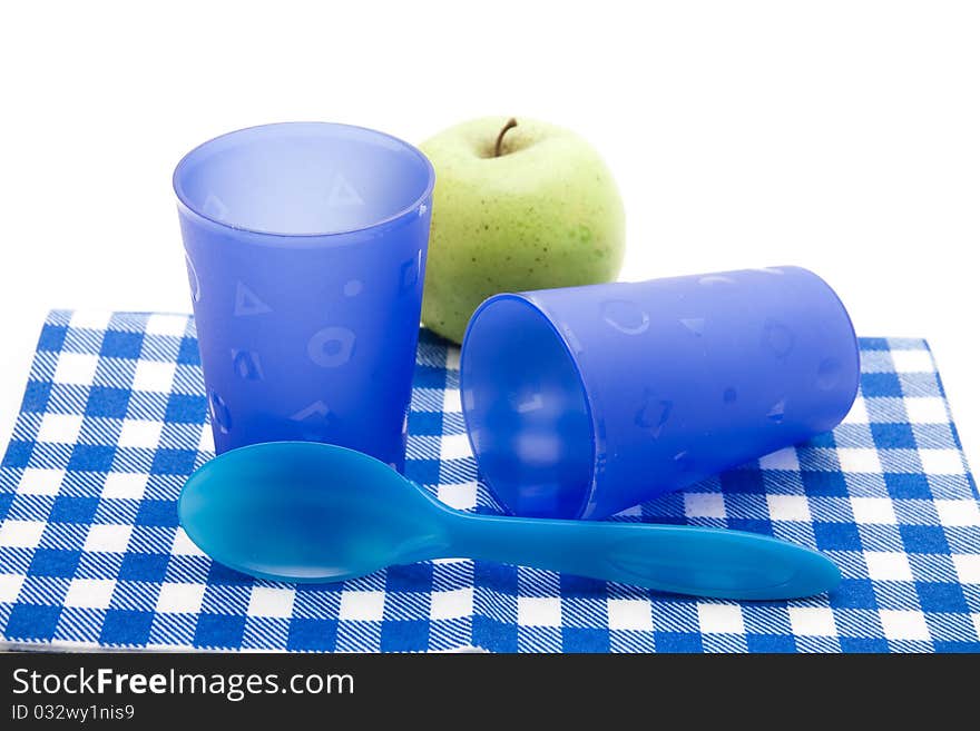 Blue cups with apple