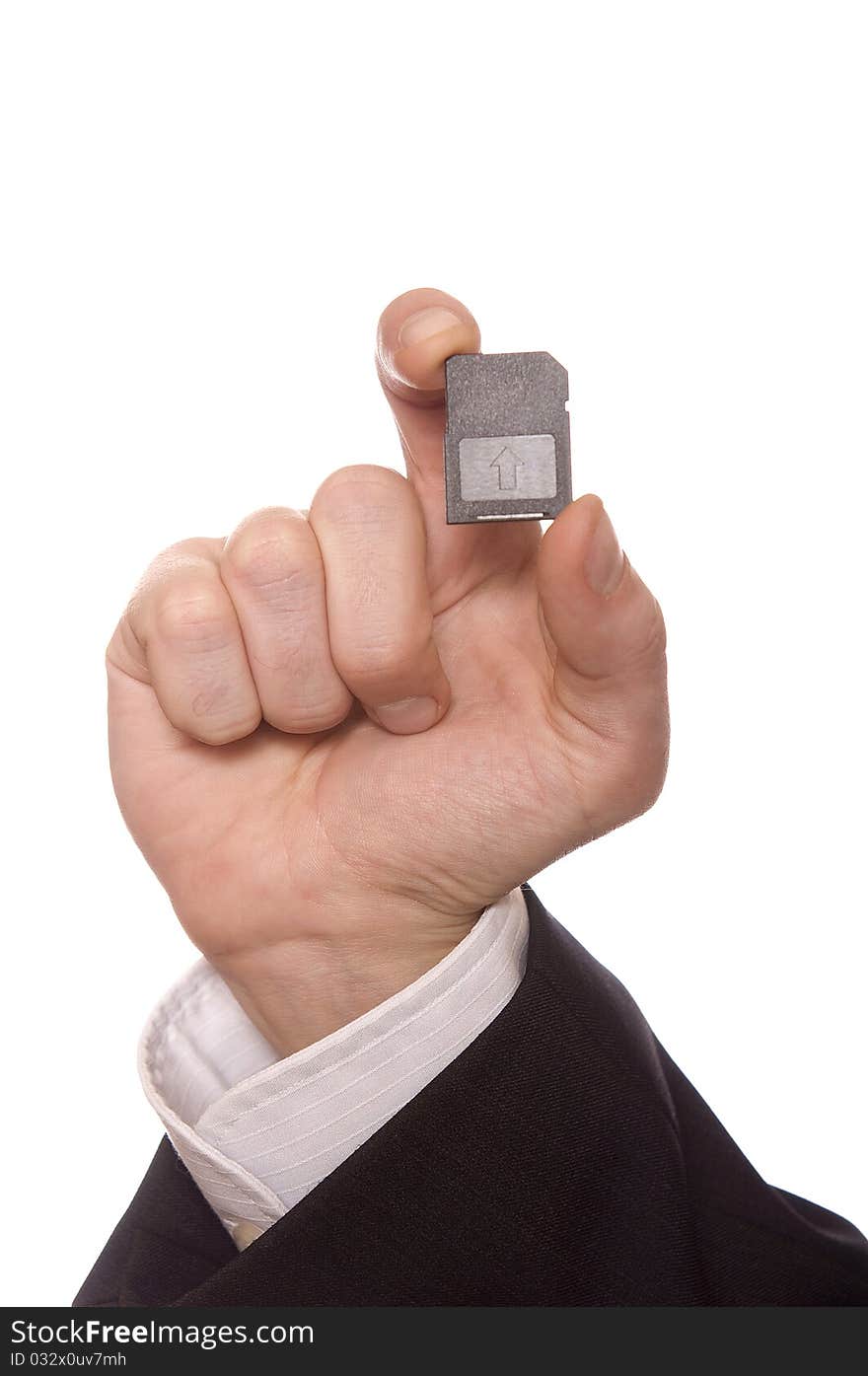 Businessman holding a Secure Digital Memory Card isolated over white