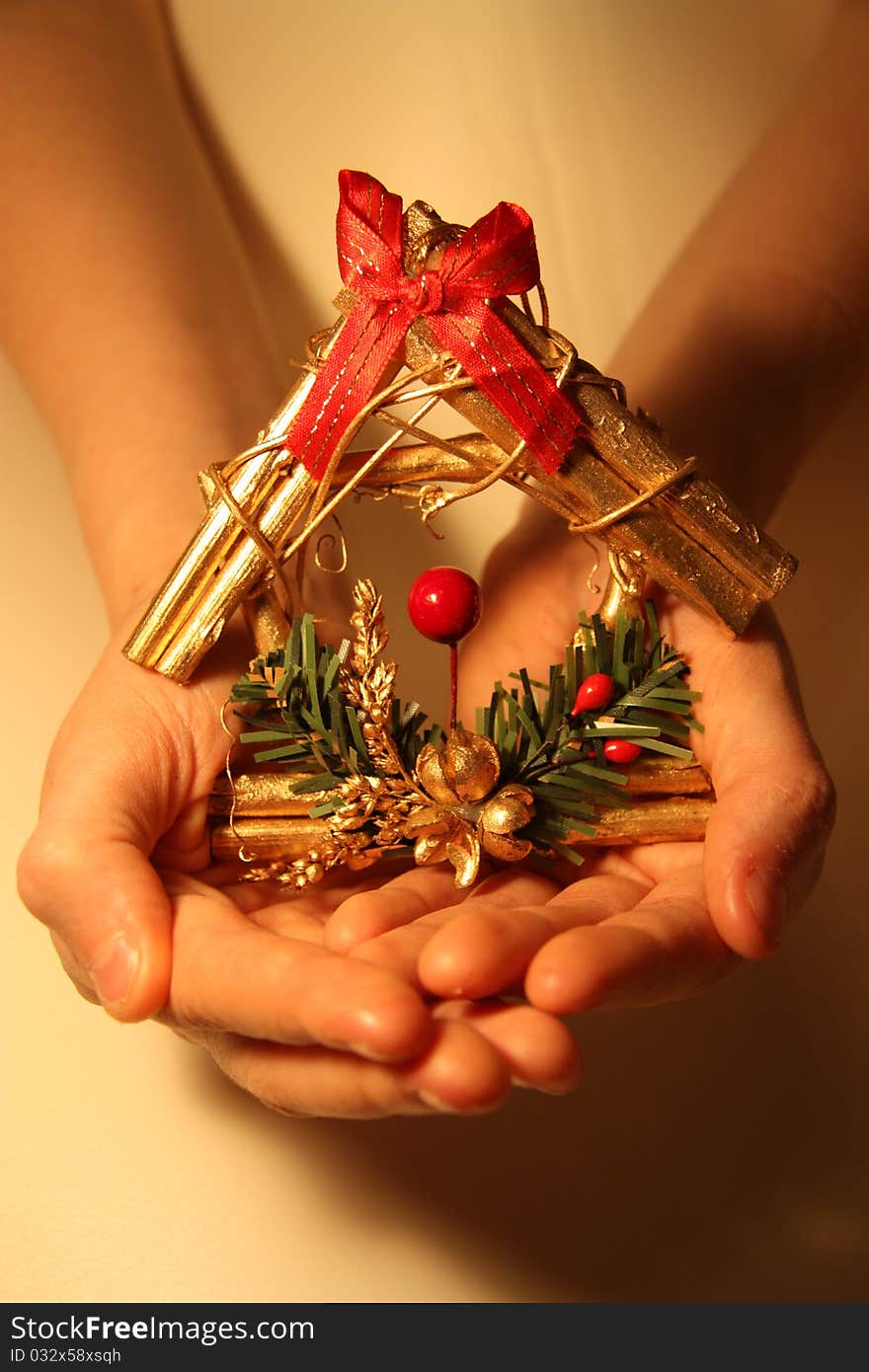 The girl holds a toy in palms. The girl holds a toy in palms