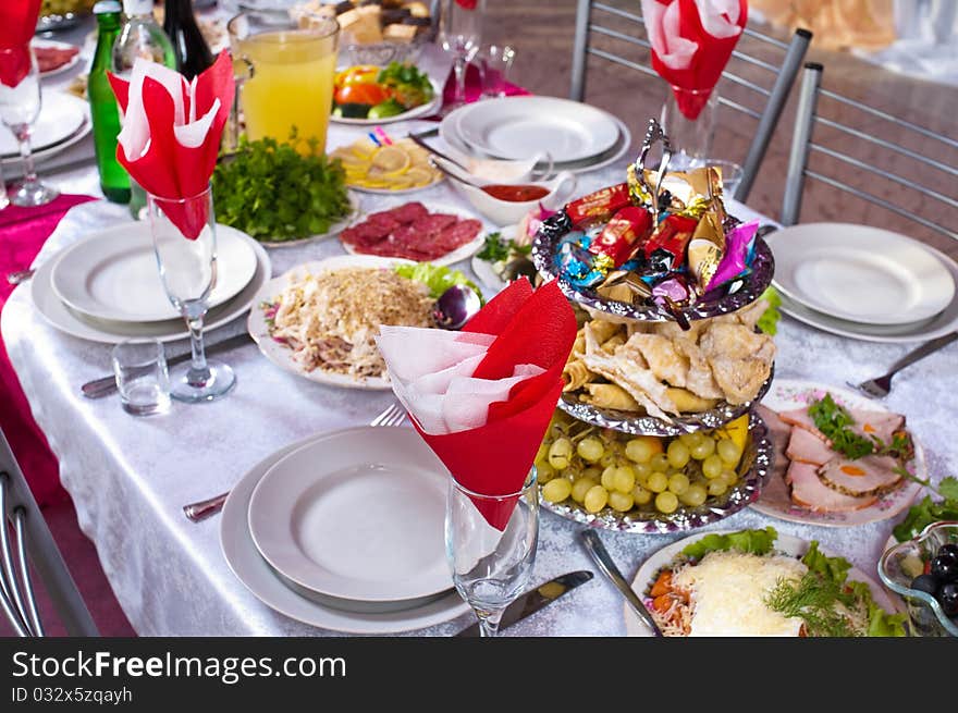 A lot of various meal on a banquet table. A lot of various meal on a banquet table.