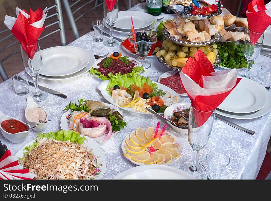 A lot of various meal on a banquet table. A lot of various meal on a banquet table.