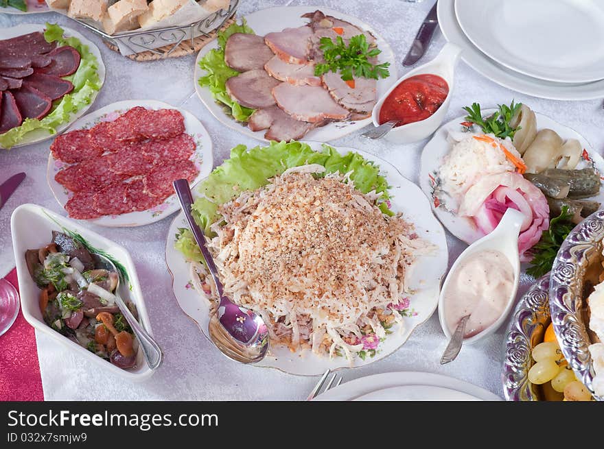 A lot of various meal on a banquet table. A lot of various meal on a banquet table.