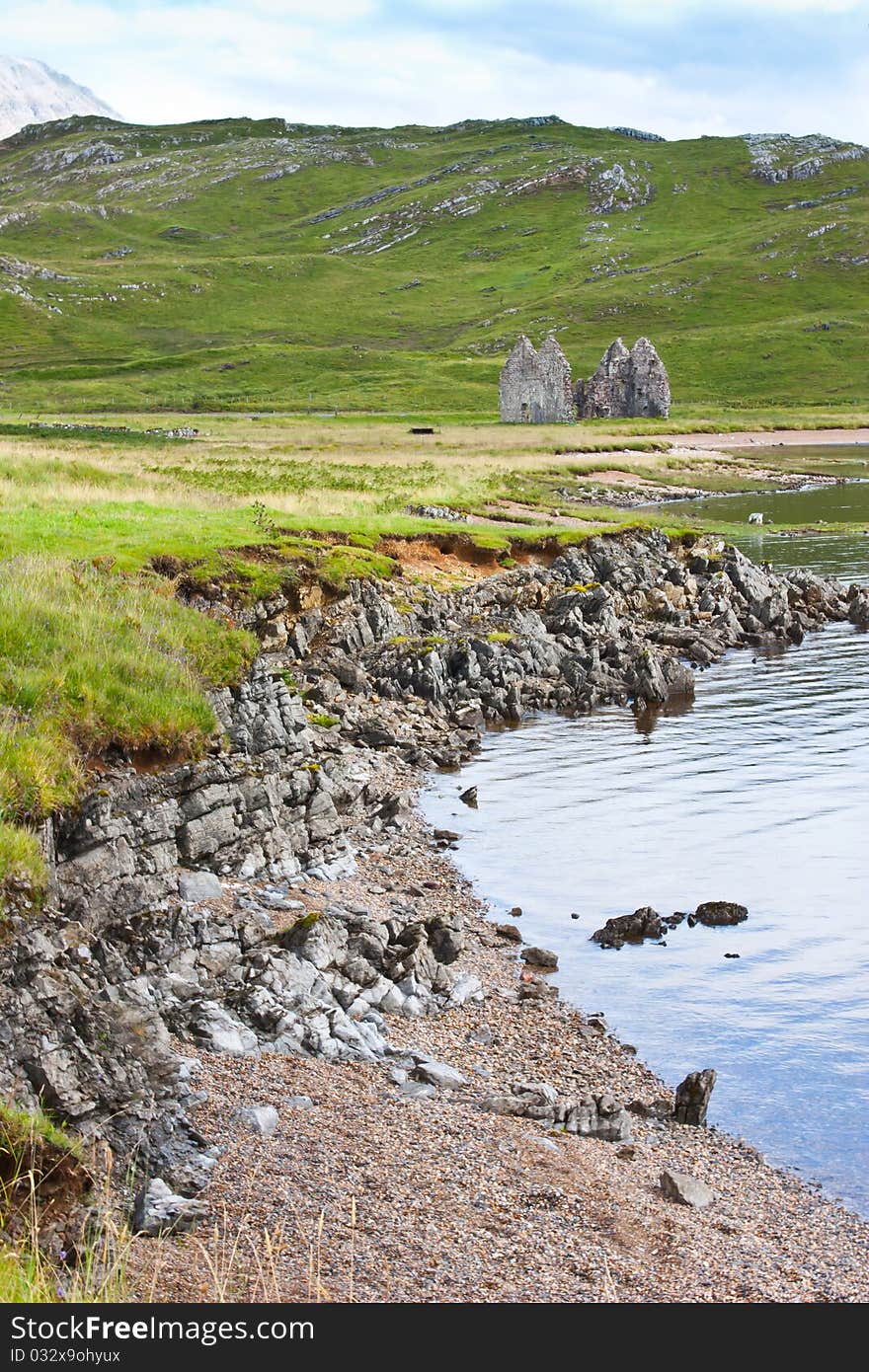 Scotland, Sutherland. Panorama with lake and old house. Scotland, Sutherland. Panorama with lake and old house.