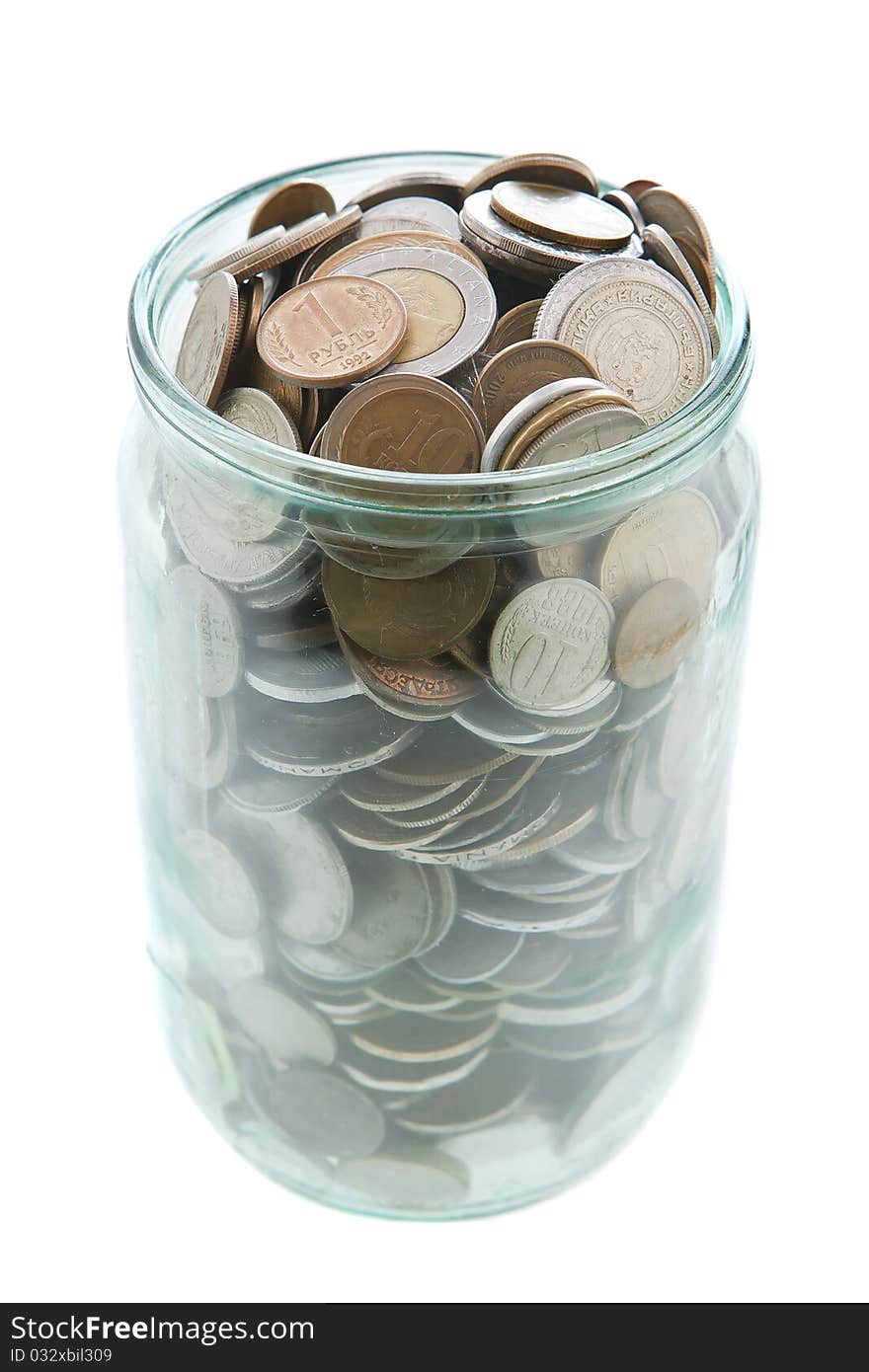 Money in glass jar on white background. Money in glass jar on white background