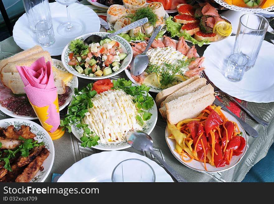 A lot of various meal on a banquet table. A lot of various meal on a banquet table.