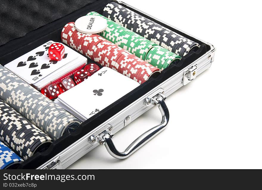 Poker set in a metallic case isolated on a white background. Close-up. Poker set in a metallic case isolated on a white background. Close-up