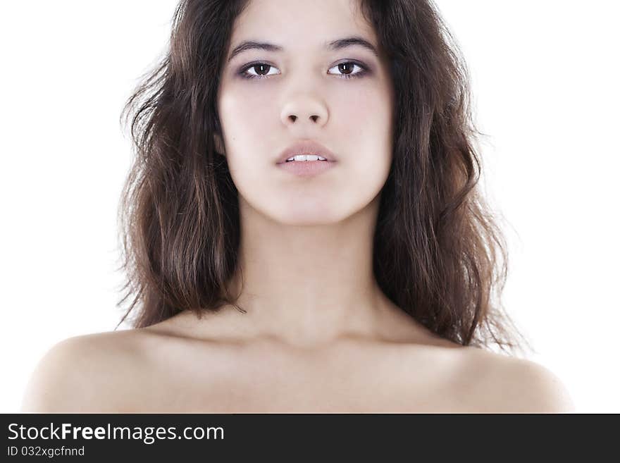 Closeup portrait of young beautiful woman with long hair