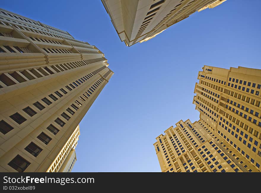 The top of three building in Dubai