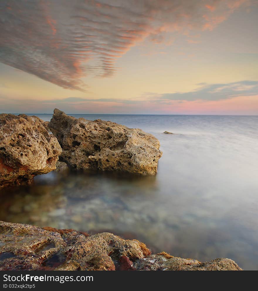 summer sea coast, a sunset over the sea