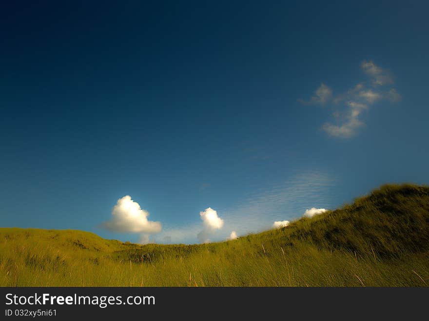 The Sky over dunes on the I land Sylt in north of Germany. The Sky over dunes on the I land Sylt in north of Germany