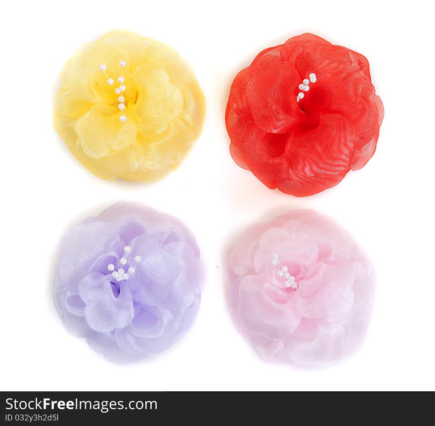 Four colored flower fabric on white background