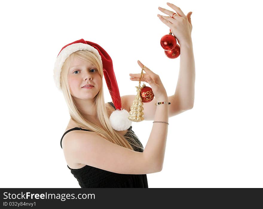 Young beautiful girl in a Santa hat on a white background