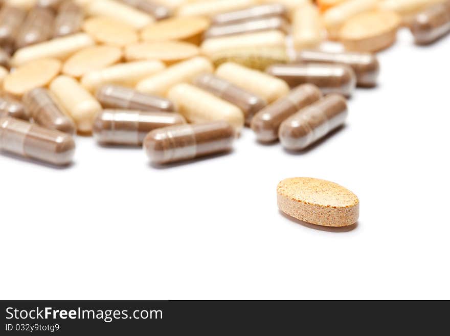 Medicinal pills piled up a bunch of closeup