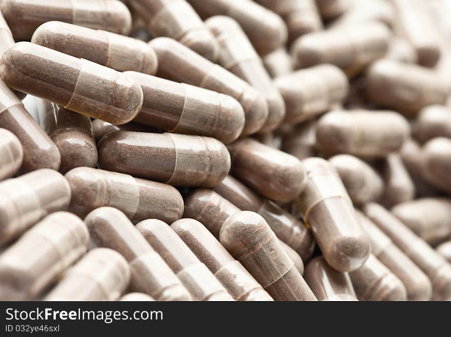 Medicinal pills piled up a bunch of closeup