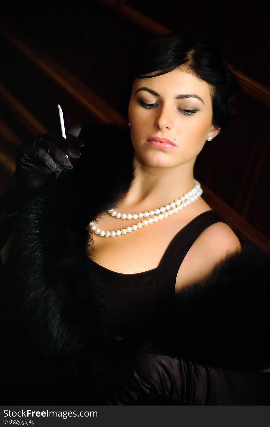 Luxurious Lady With A Cigarette. Vintage Style.