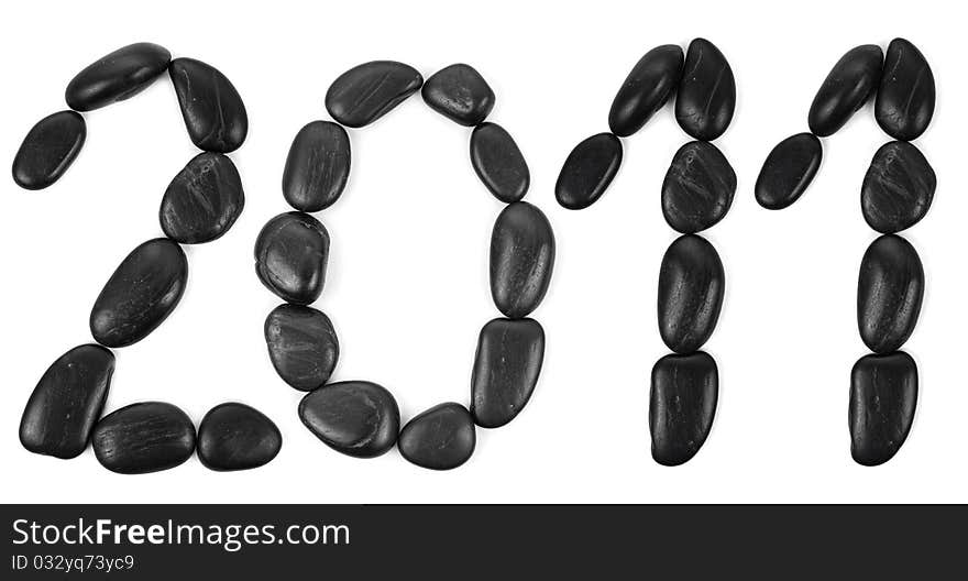 Numbers made from stones isolated on white