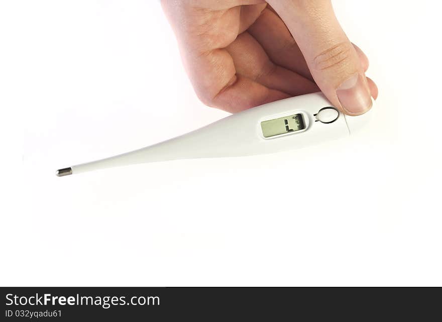 Fingers holding electronic termometer on white background