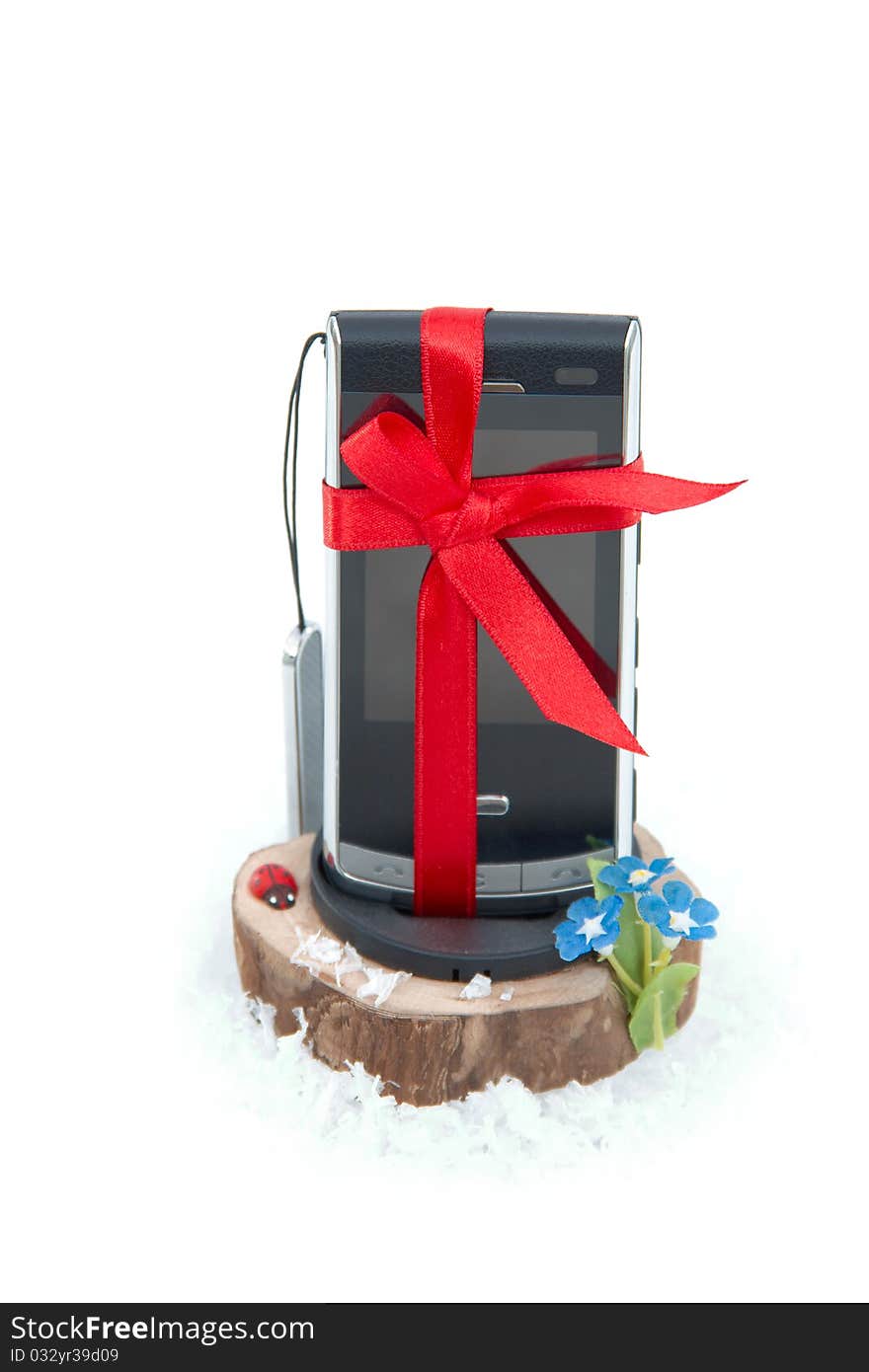 Mobile phone in a gift by a holiday