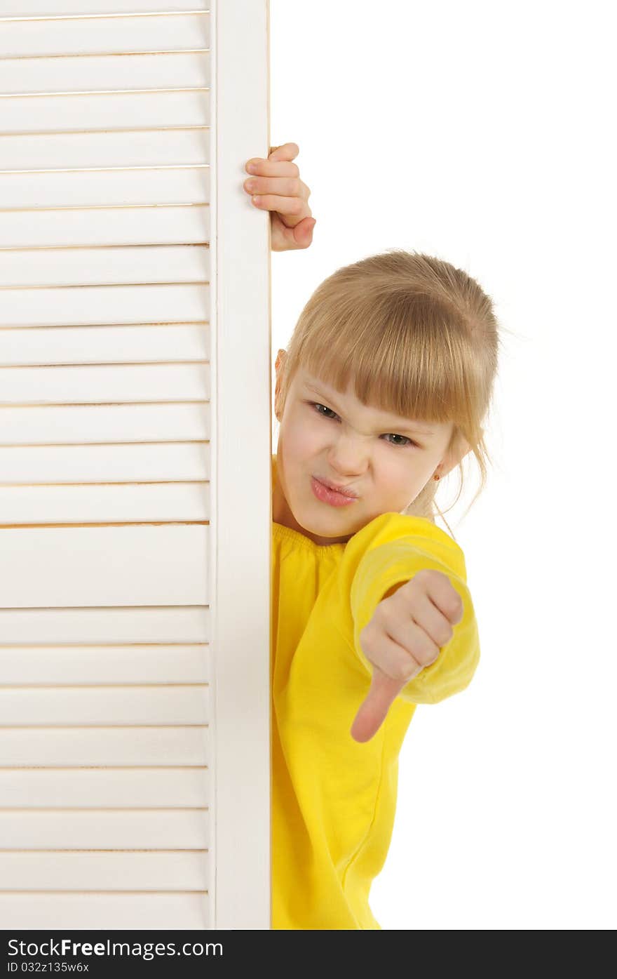 Dissatisfied girl in yellow jacket it is isolated on the white