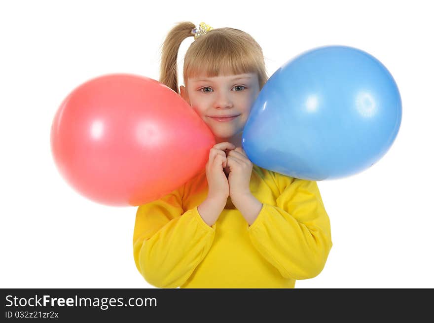 Little girl with colour balls it is isolated on the white