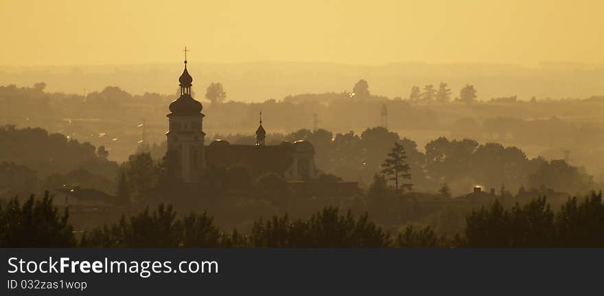 The church in town Pszow in Poland at sunrise. The church in town Pszow in Poland at sunrise