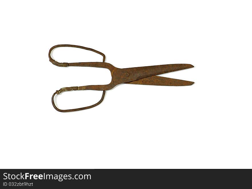 Vintage rusty forged scissors isolated on white background. Vintage rusty forged scissors isolated on white background