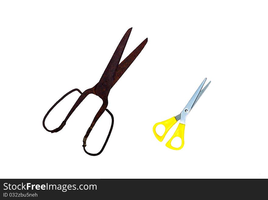 A couple of scissors - vintage and modern, isolated on white background. A couple of scissors - vintage and modern, isolated on white background