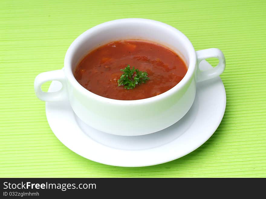 Tomato soup with basil leaf