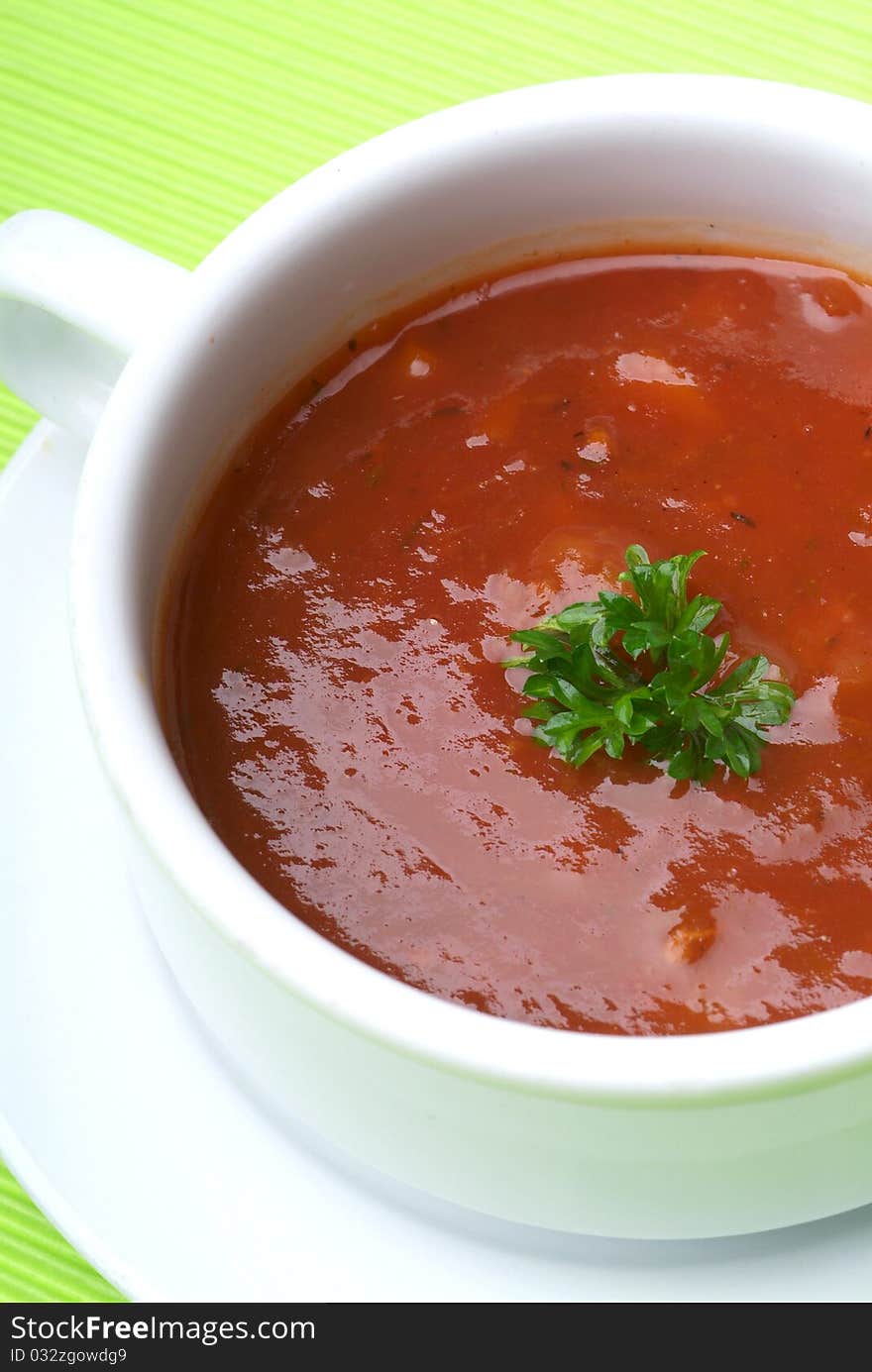 Tomato soup with basil leaf