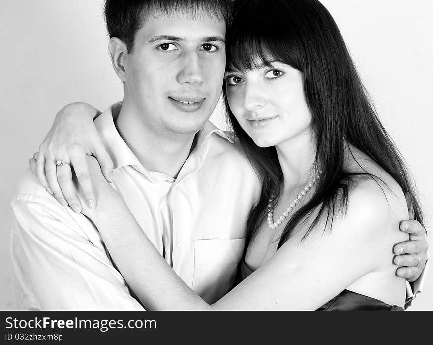 Desaturated portrait of love couple in studio