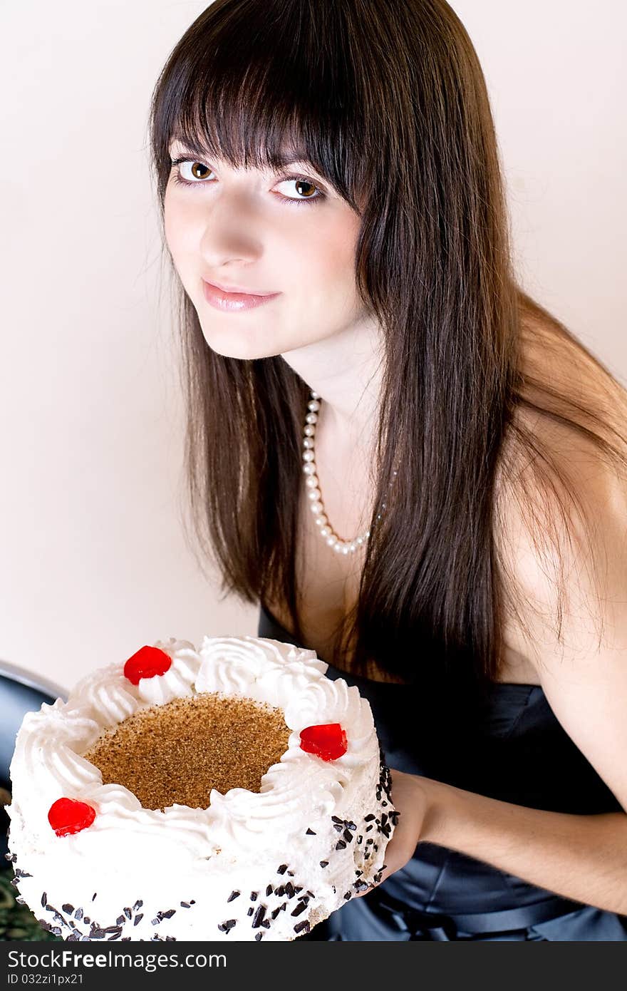 Young beauty woman with sweet cake