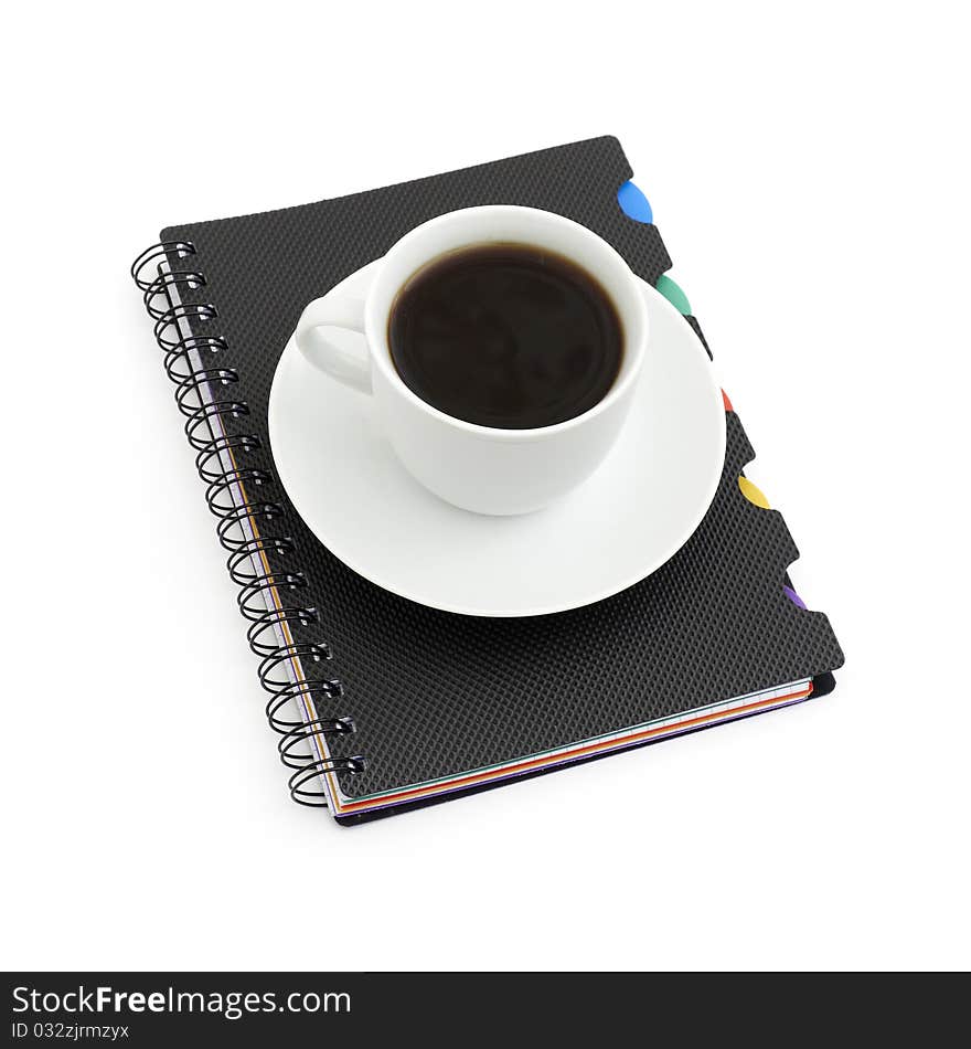 Worktable covered with documents and cup coffee