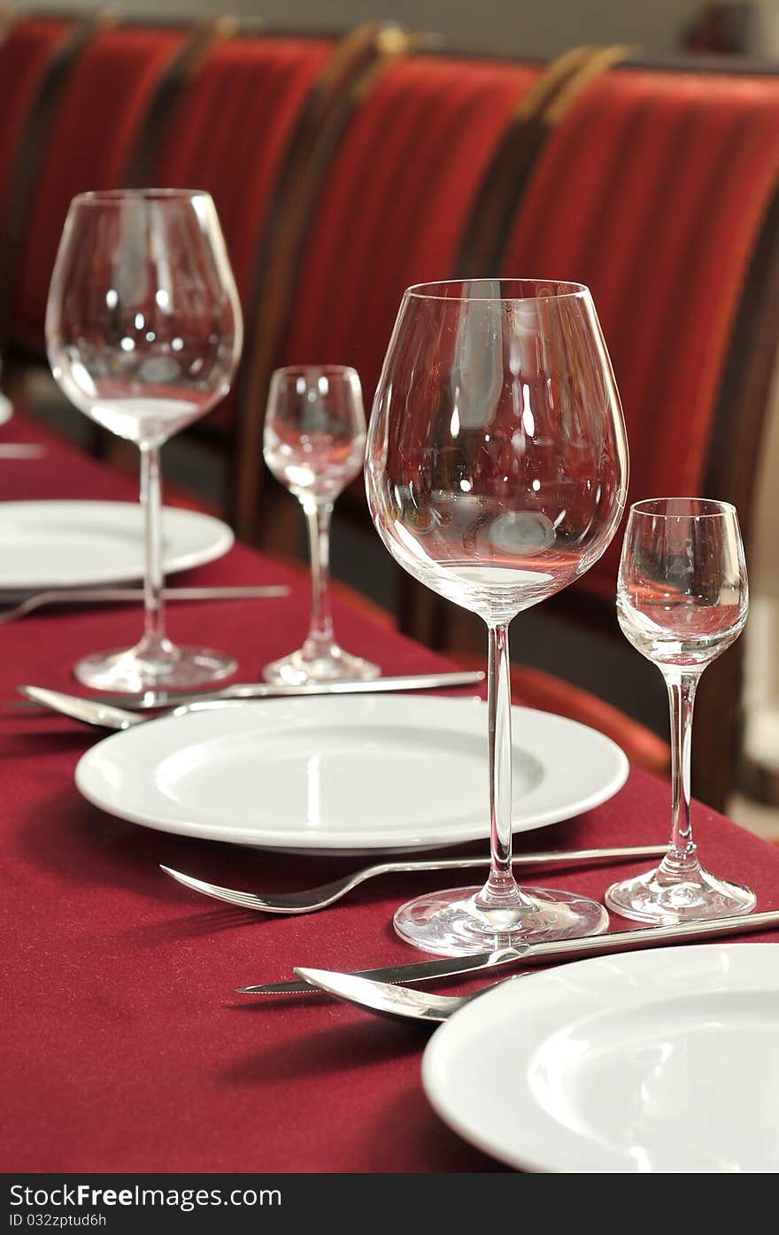 Wine glasses on a table at restaurant.