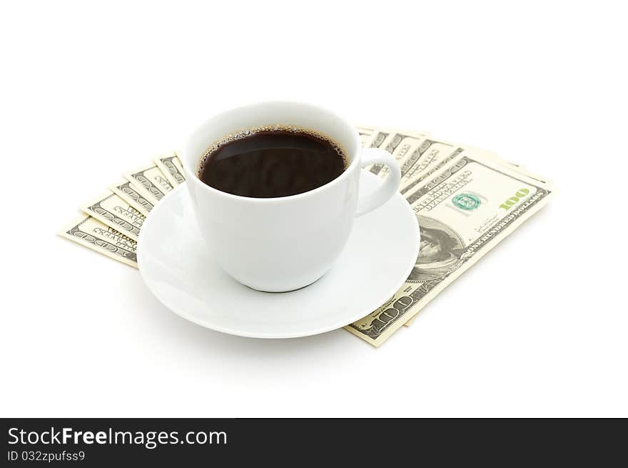 Coffee cup and dollar close up