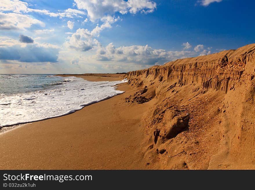 View on sand beach, sea and sky background. View on sand beach, sea and sky background