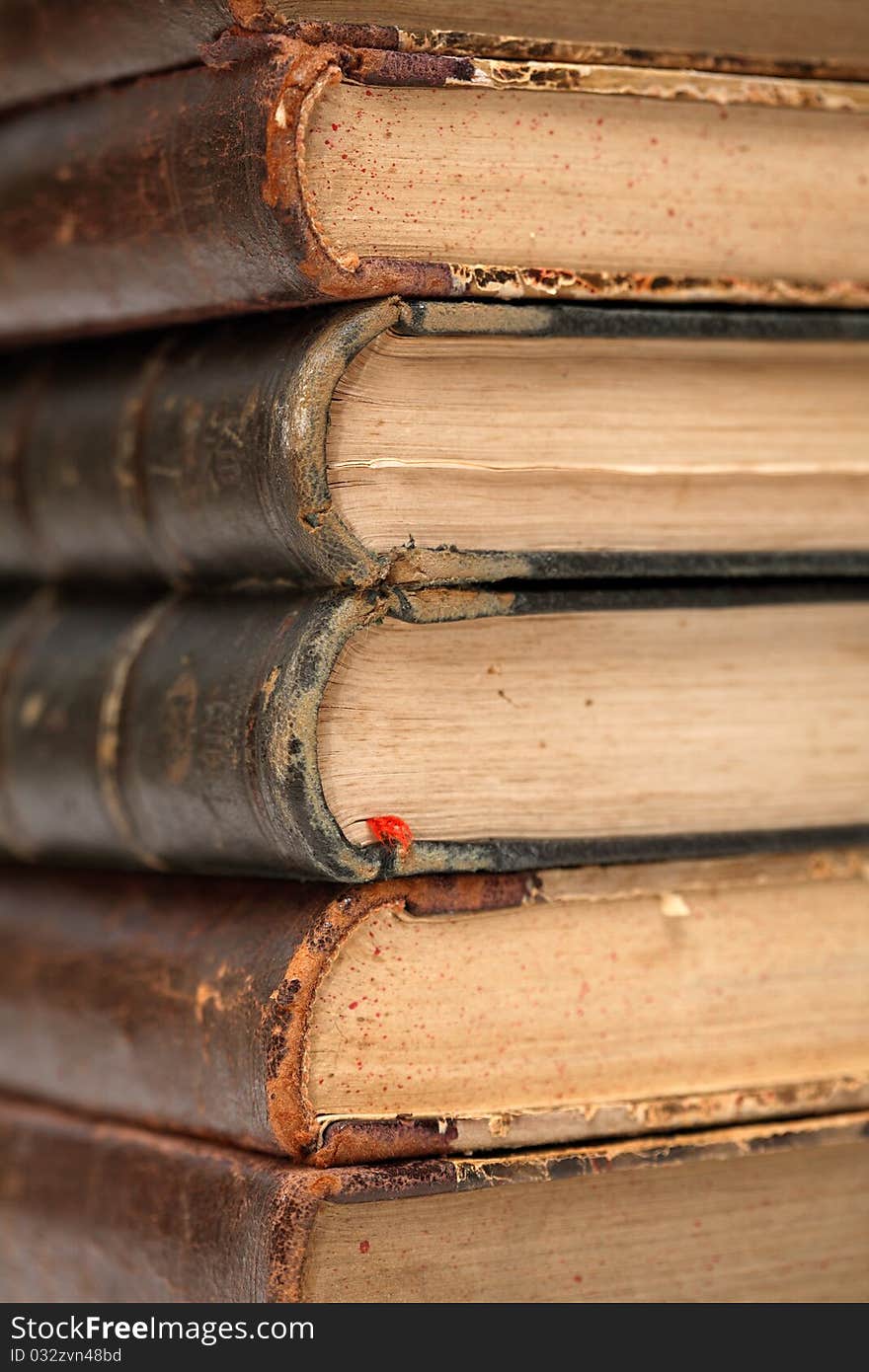 Background made from stack of very old books. Extreme closeup. Background made from stack of very old books. Extreme closeup