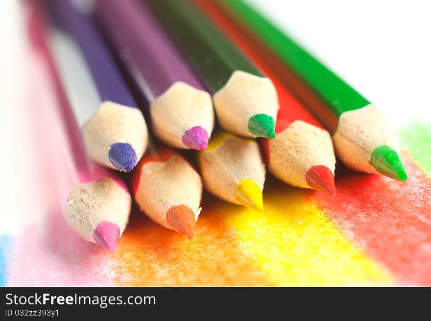 Colorful pencils lying on each other