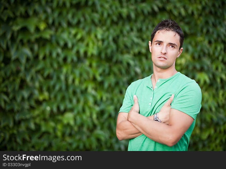 Portrait of a casual handsome man outdoors