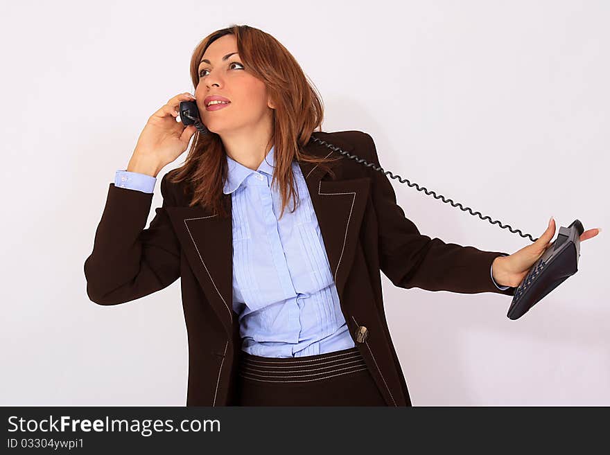 Attractive secretary talking on the phone