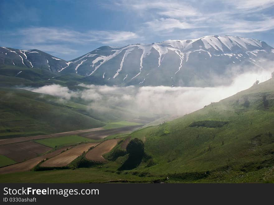 Morning mist in a mountain valley