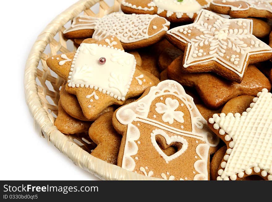 Various shapes of christmas gingerbread decorated with white topping