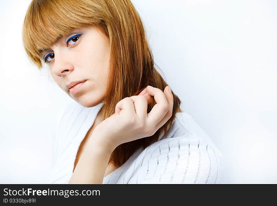 Portrait of a beautiful female model on white background