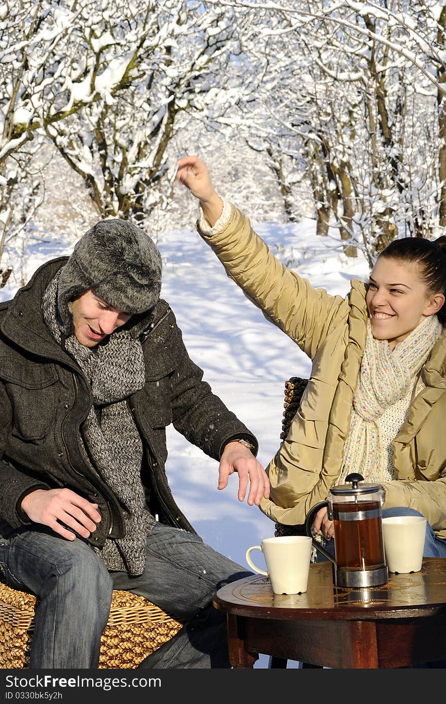 Couple Playing With Snow