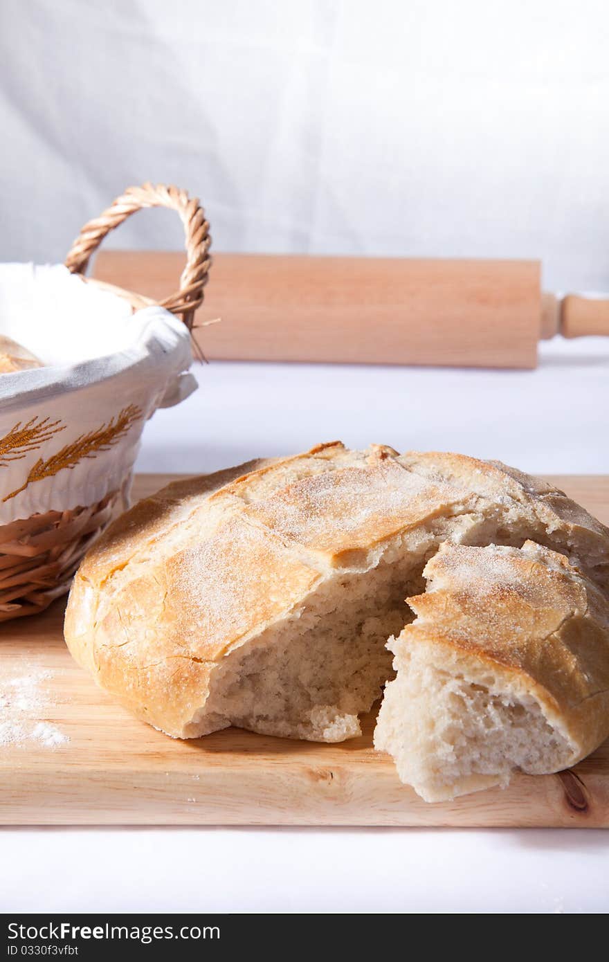 Fresh cooking bread on the wooden desk. Fresh cooking bread on the wooden desk