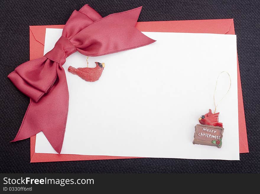 Congratulatory letter with a red envelope and a scarlet ribbon.