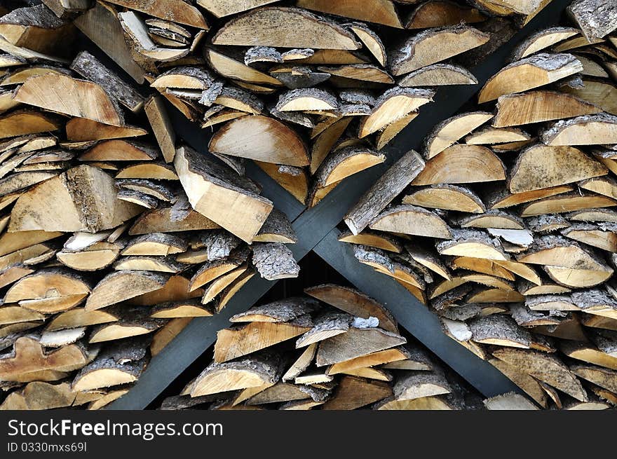 Fire wood. Woodpile in the rural house